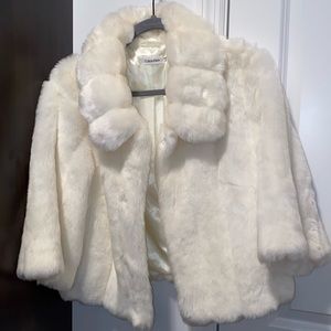 Calvin Klein cream colored faux fur jacket. Size M